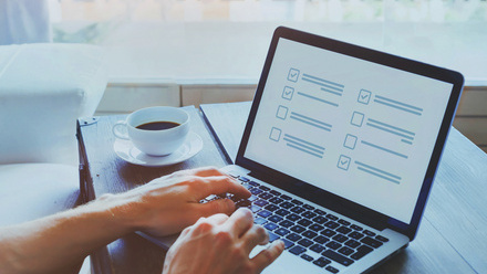 Filling in a survey on a laptop.jpg