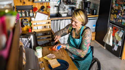 Woman in wheeltchair preparing food.jpg