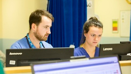 s300_hospital-staff-looking-at-screens.jpg