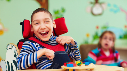 Disbabled child smiling.jpg