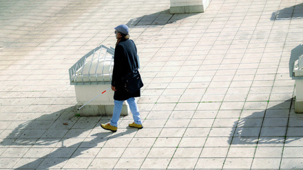 Blind person walking on street iStock-2208274881.jpg