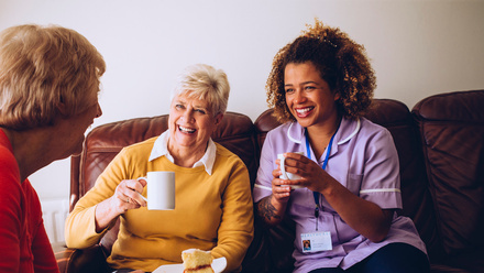 Care workers and two ladies.jpg