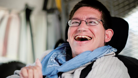Disabled man smiling.png