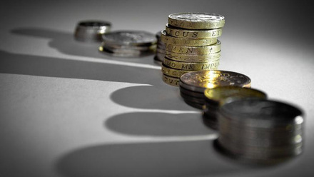 money - line of coins with shadows - 940 x 640.jpg 1